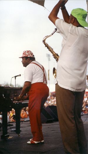 Reggie and Fats Domino on stage at The New Orleans Jazz and Heritage Festival.