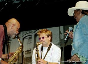 Reggie with Patrick Lamb and Charmaine Neville at The Waterfront Blues Fest. (Photo by Kathy Rankin)
